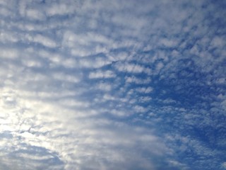 partly cloudy sky at summer sunset