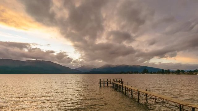 Empty Jetty By The Lake, Te Anau, Southland, New Zealand. Motion Time Lapse Pan Left