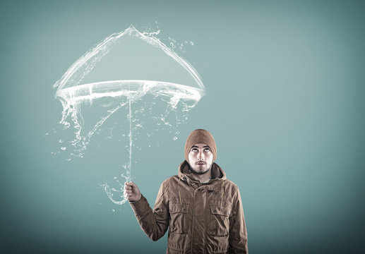 Young man under an umbrella