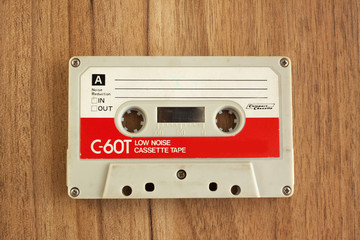 Cassette tape on wooden background