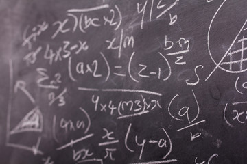 Close up of blackboard with maths equations