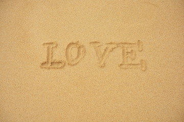 Love You in den sand geschrieben