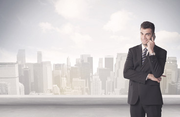 Sales person talking in front of city scape