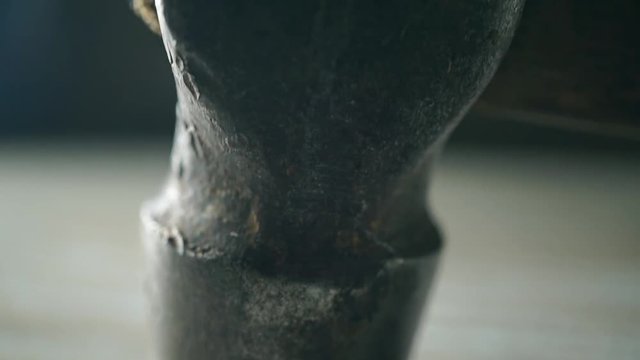 Old hammer with wooden handle macro video