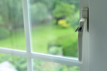 Window with view of summer backyard