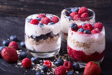 yogurt with oatmeal , blueberries , raspberries and strawberries