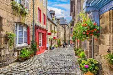 Wall murals Narrow Alley Idyllic scene of traditional houses in narrow alley in an old town in Europe