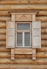 Fototapeta na wymiar Old Russian Style Window with Wood Frame