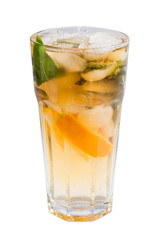 glass of cold fruit cocktail with ice, mint and pieces of fruit on a white background