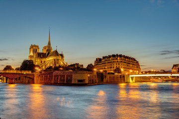 The Ile de la Cite with the famous Notre Dame cathedral in Paris at sunset