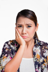 Asian woman suffering from toothache