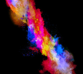 Explosion of colored powder on black background