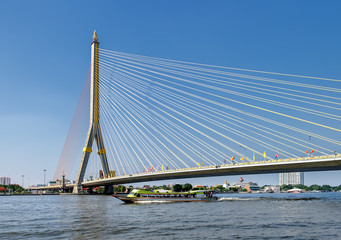 Fototapeta na wymiar The Rama VIII bridge over the Chao Phraya river in Bangkok, Thailand.