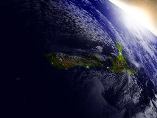 New Zealand from space during sunrise © harvepino