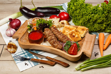 kebab with vegetables and lavash