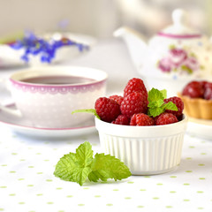 raspberries fuits in a bowl on a table