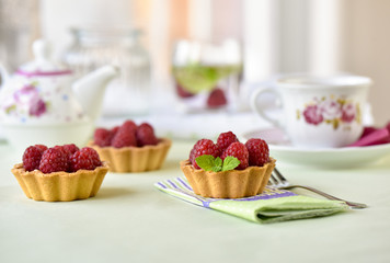 Fruit raspberry tarts on a table