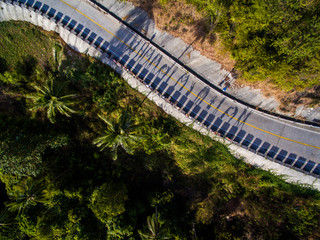 People's shadow at jungle way by aerial view 