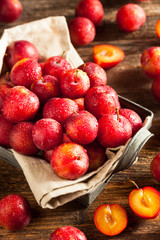Fototapeta na wymiar Fresh Raw Organic Cherry Plums