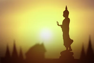 Photo sur Plexiglas Bouddha Silhouette of Buddha.Background sunrise