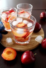 slivovitz (plum brandy) with ice and fresh plums 