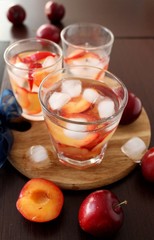 slivovitz (plum brandy) with ice and fresh plums 