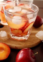 slivovitz (plum brandy) with ice and fresh plums 