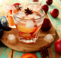 slivovitz (plum brandy) with ice and fresh plums 