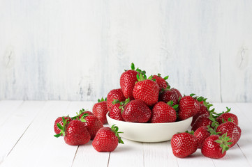 Strawberries in white bowl - 115352761