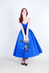 Fototapeta na wymiar Woman in blue dress