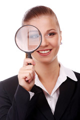 businesswoman with magnifying glass