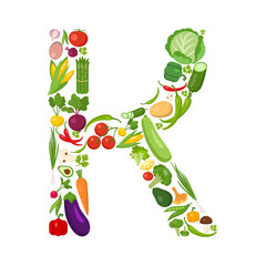 K letter from vegetables. Green alphabet. Fresh green vegetables for healthcare. Healthy diet concept. All vegetables like carrot, onion, tomato, pepper, cucumber, cabbage.
