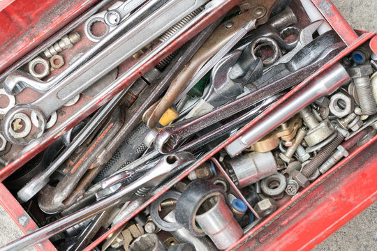 Well Used Old Tools And Red Tool Box
