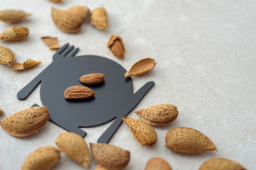 almonds nuts on a rustic background