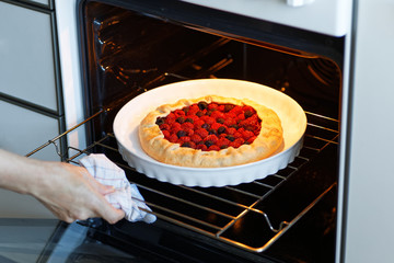Homemade biscuit with red and black raspberries