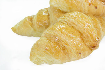 Single Butter Croissant isolated on white - clipping path includ