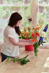 Bouquet drawing up/Photograph of girls, which  drawing up Bouquet from wild and garden flowers