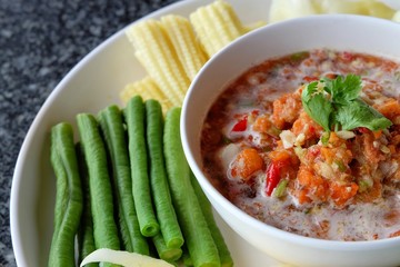 Crab eggs chili sauce served with vegetable, Thai food