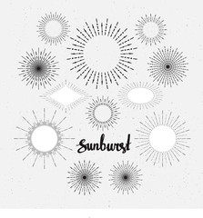Set of vintage sunbursts.  Hand-drawn vector hipster design elements on the textured background.