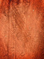 Tire tracks on the road gravel stone background