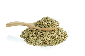 Dried rosemary leaves in wooden spoon over white background