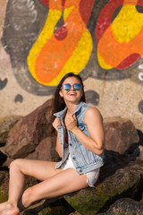 Beautiful young woman at the beach