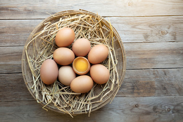 Eggs on wooden table. Top view with copy space