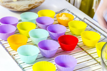 colorful forms for muffins ready for cooking