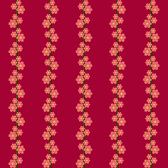 Picture of vines on a red background.