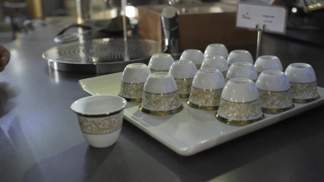 A Man pouring arabic coffee - Mırra