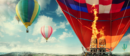 Colorful balloons flying in the mountain