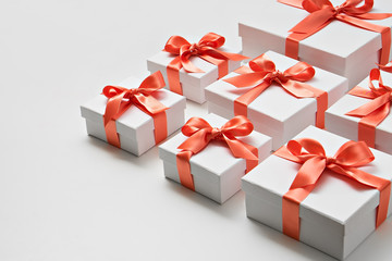 gifts.  white boxes with orange ribbon