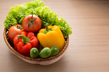 Fresh vegetable prepared in bowl on wooden table, Lettuce cucumb