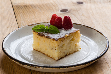 baked rice pudding with rasberry